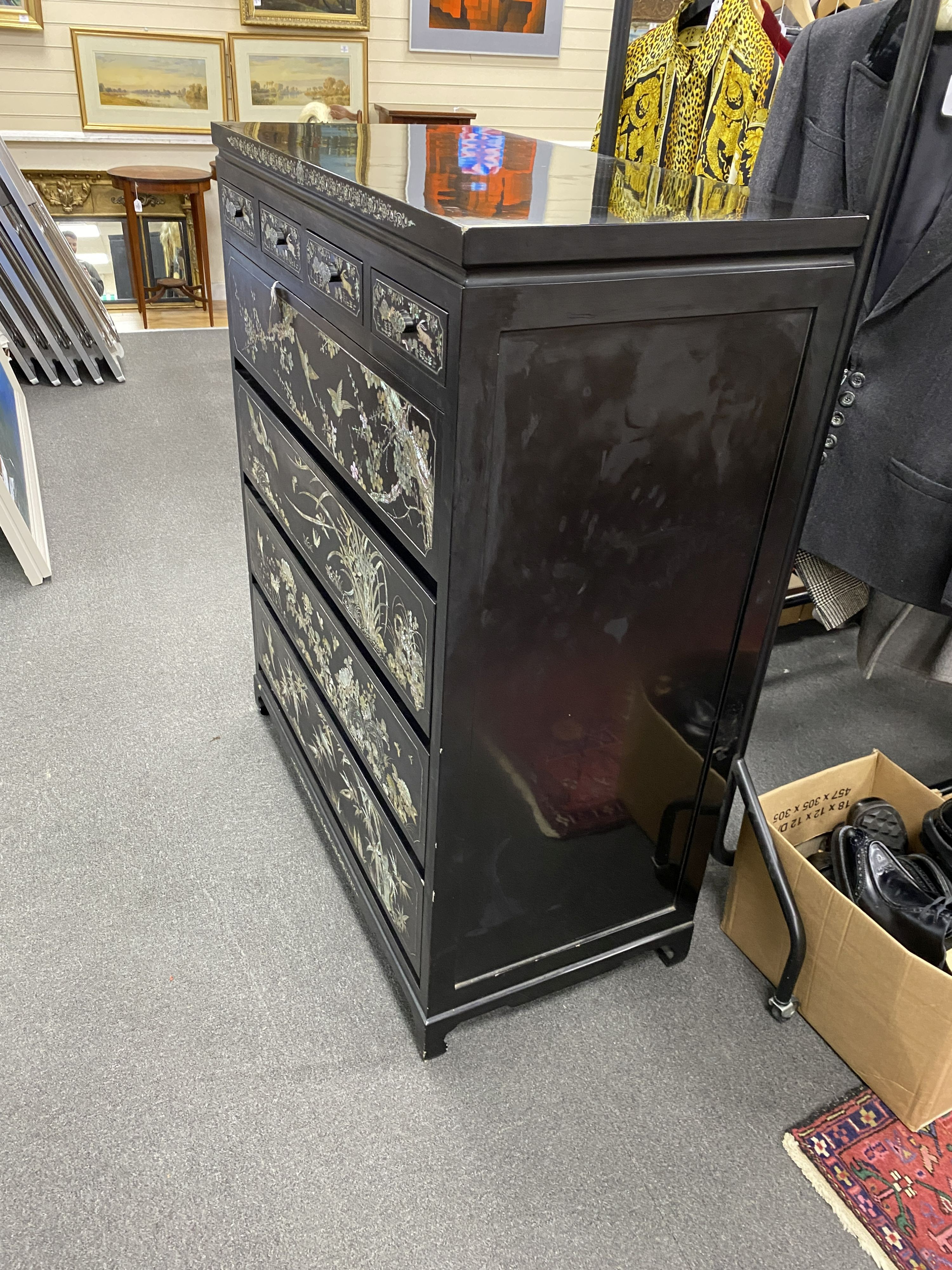 A Japanese black lacquer and mother of pearl inlaid kimono chest, width 104cm, depth 52cm, height 128cm